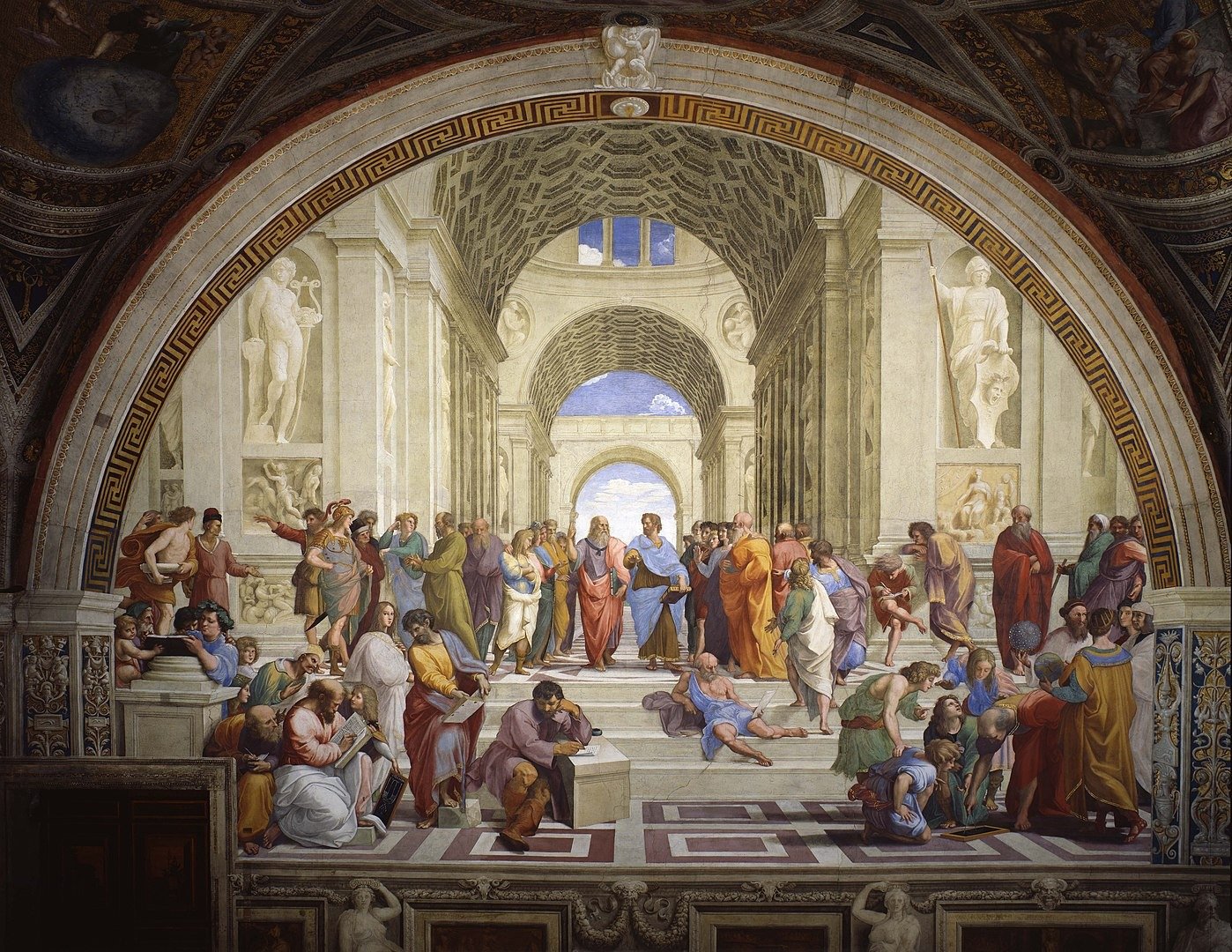Фреска Рафаэля Санти «Афинская школа». Центральные фигуры это Платон, указующий на небо, и Аристотель, указывающий на землю